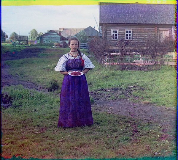 Girl with strawberries. (1909)