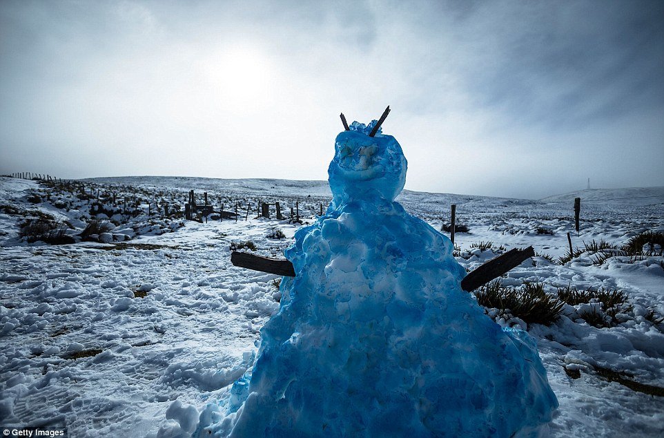  A lone snowman sits in the cold on Saturday in Cradle Mountain, Australia