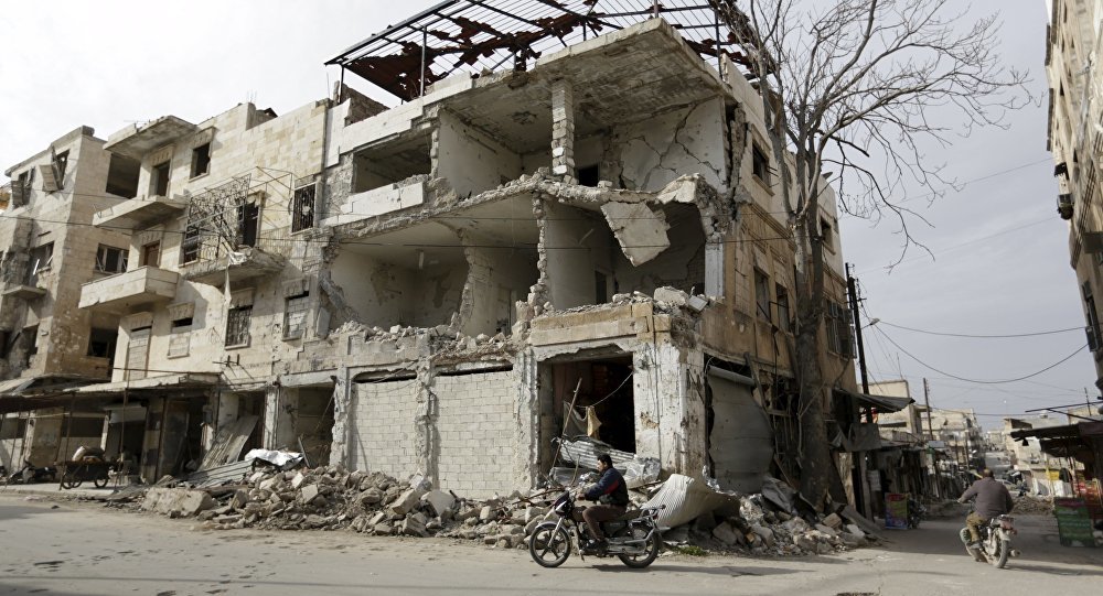 Damaged buildings in Idib, Syria