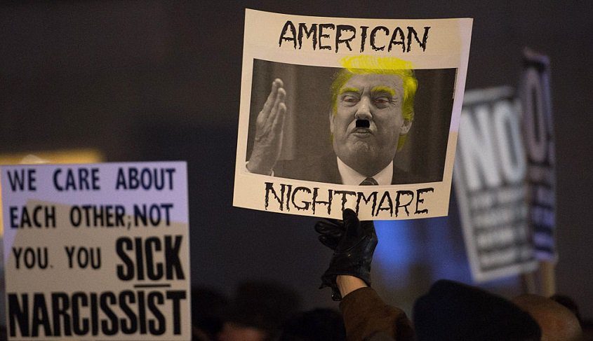 trump hitler protest sign