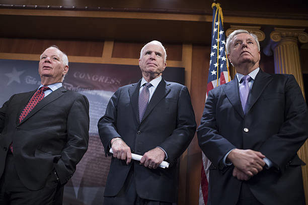 From left, Sens. Ben Cardin, D-Md., John McCain, R-Ariz., and Lindsey Graham, R-S.C.