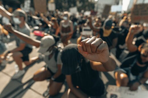 protest kneeling fists raised