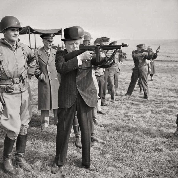 Churchill shoots Tommy Gun